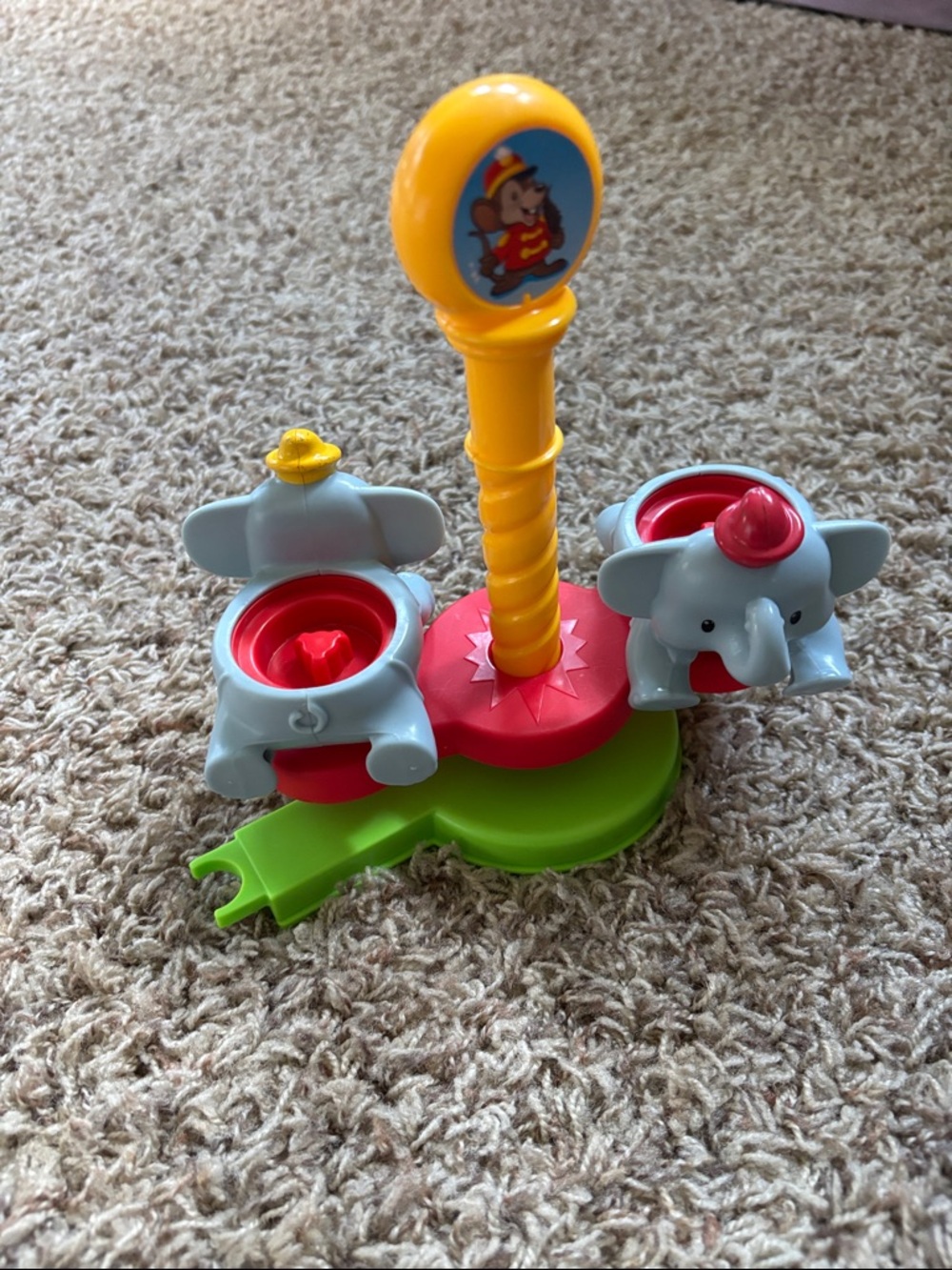 Fisher-Price Little People Disney Dumbo Spinning Elephants Ride toy.